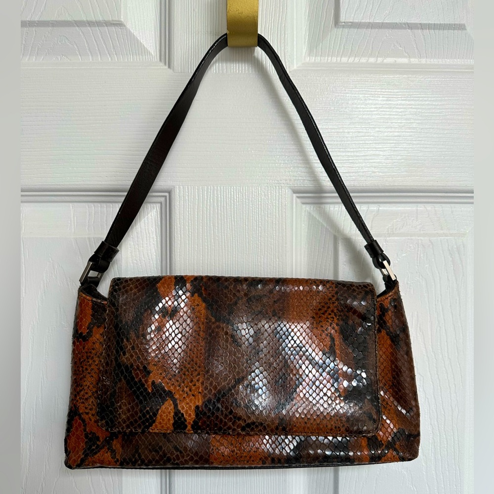 Kenneth Cole New York animal print shoulder bag. Trending now animal print!